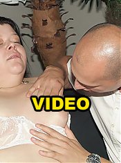 Margaret bares her clothes to expose her massive folds of fat while a cock goes inside her twat